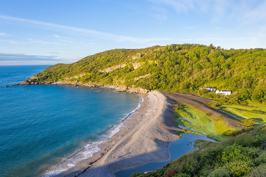 Looking down on Pwll Du Bay from the Wales Coast Path by Noodle Photography