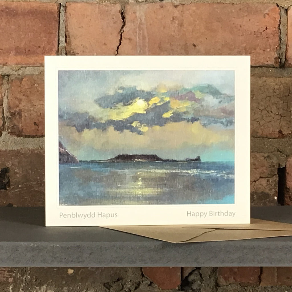Happy birthday (Penblwyydd Hapus) card with a watercolour print of Rhossili at twighlight.