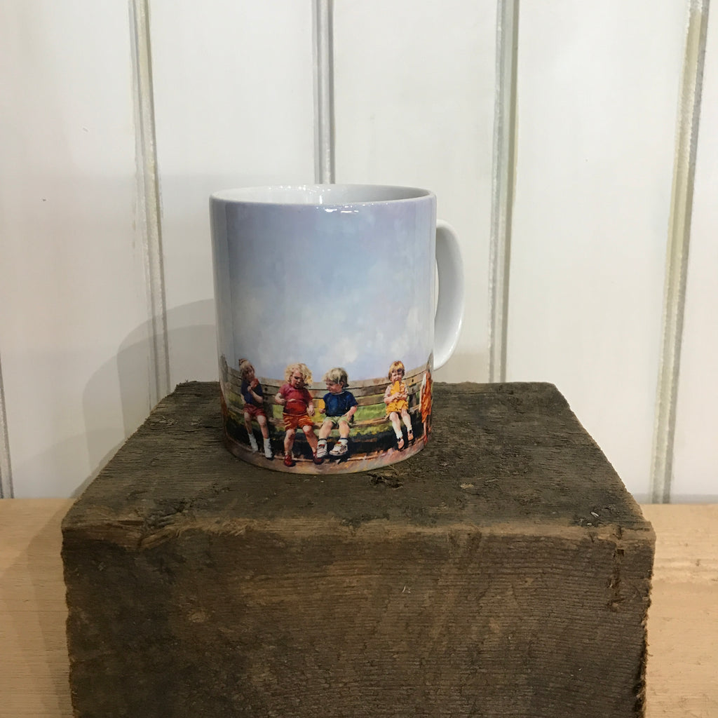 Ceramic mug illustrated with the painting Lolly Time by Arwen Banning. A painting of children sitting on a bench enjoying their lollies.