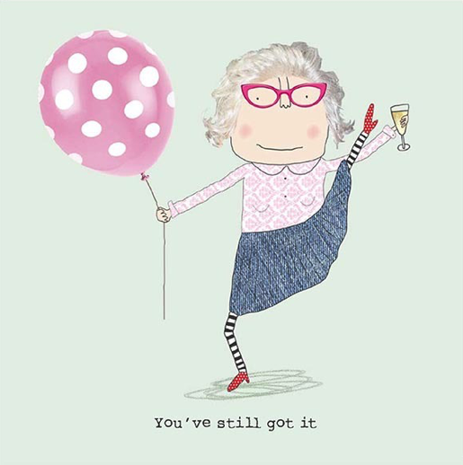 Greetings Card with a gran holidng a baloon and a glass with one foot in the air and the caption "you've still got it".