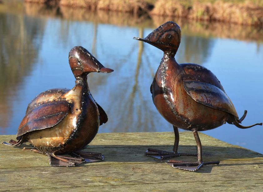 Fairtrade metal duck in sitting or standing position.