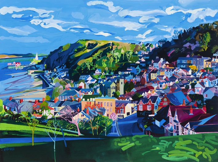 The village of Mumbles from Oystermouth Castle with the pier and lighthouse in the distance. 