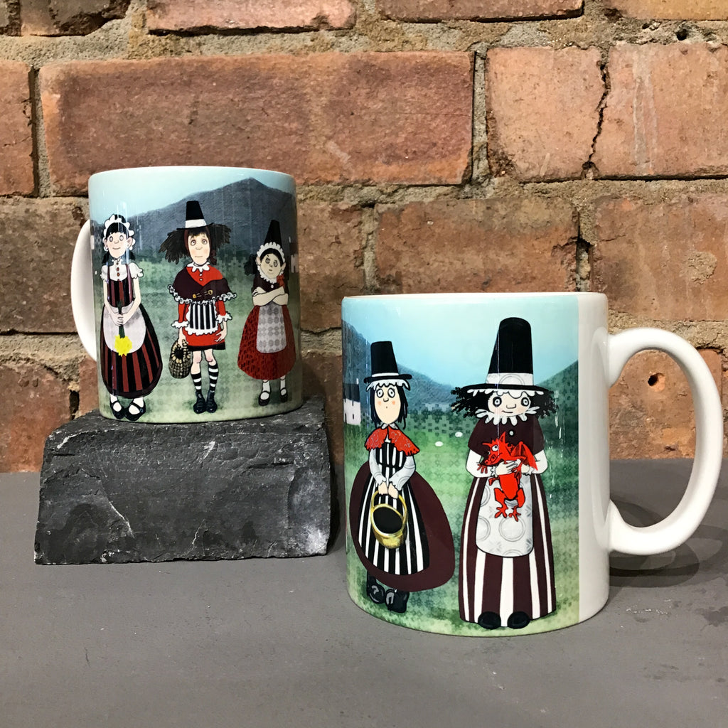 Mug with illustration of five Welsh ladies in the countryside.