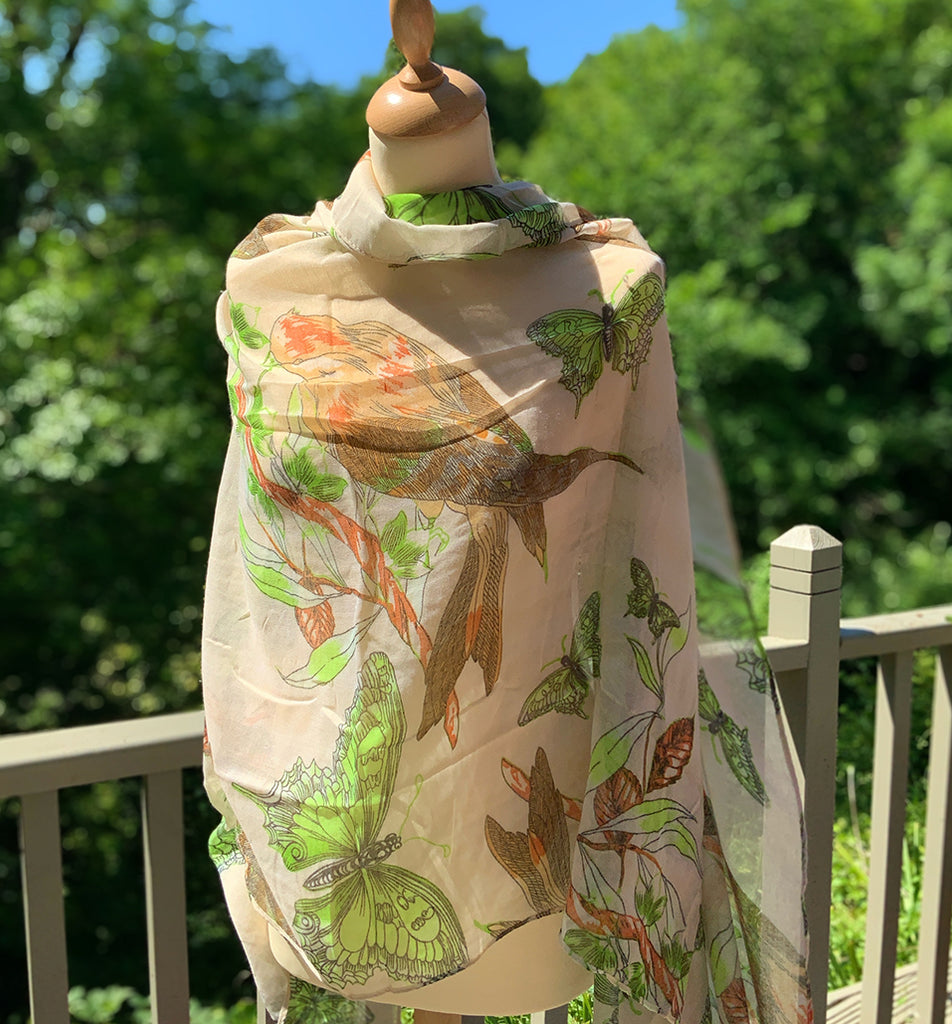 Pale cream lightweight scarf with lime green butterflies and sepia coloured birds