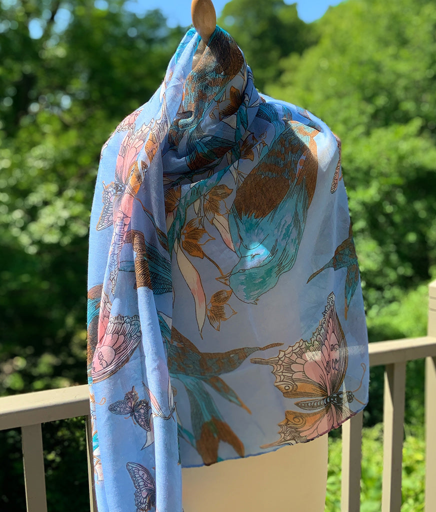 pale blue or lilac chiffon scarf illustrated with birds and butterflies