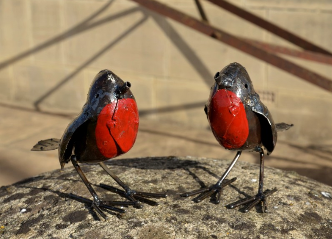 Two metal robin sculptures 