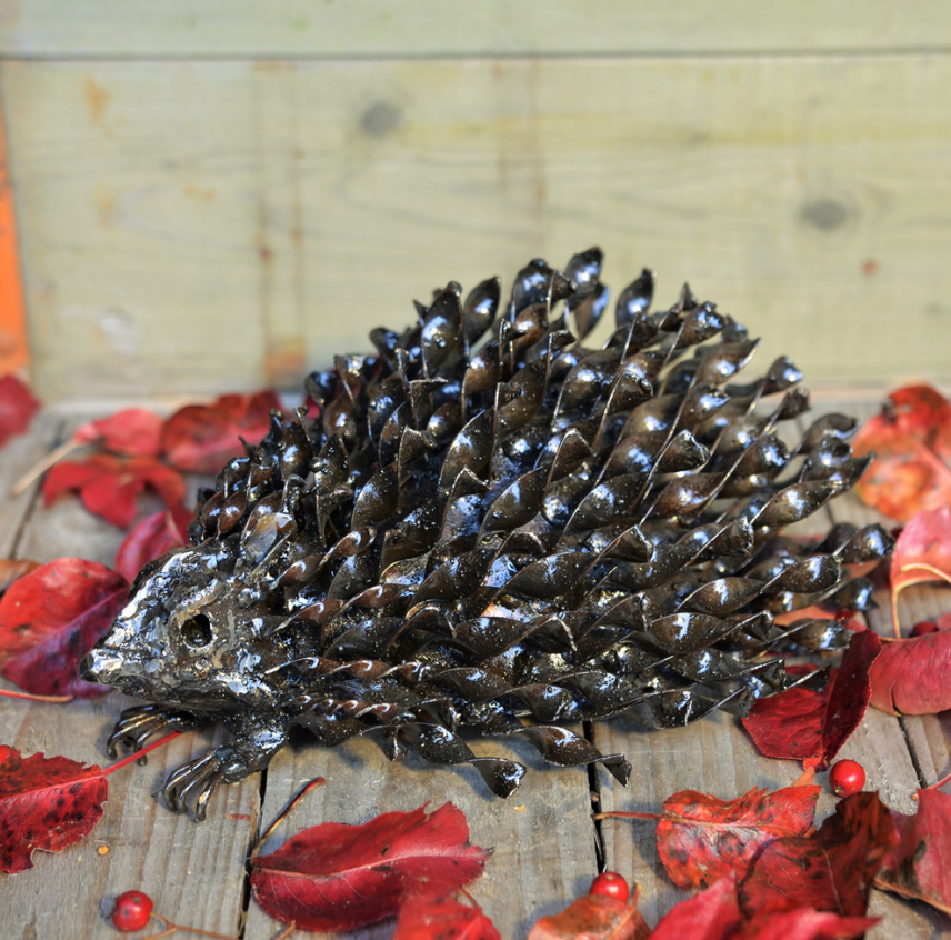Fairtrade metal hedgehog garden sculpture.