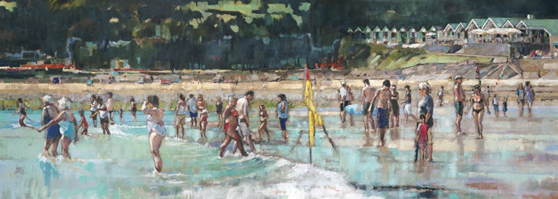 oil painting of Langland Bay with Welsh artist Arwen Banning . The painting shows people on the beach and in the sea set against the view of the Langland Brasserie restaurant and the beach huts.
