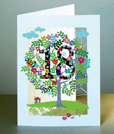 paper cut eighteenth birthday card with the 18 in the branches of a colourful lazer cut tree.
